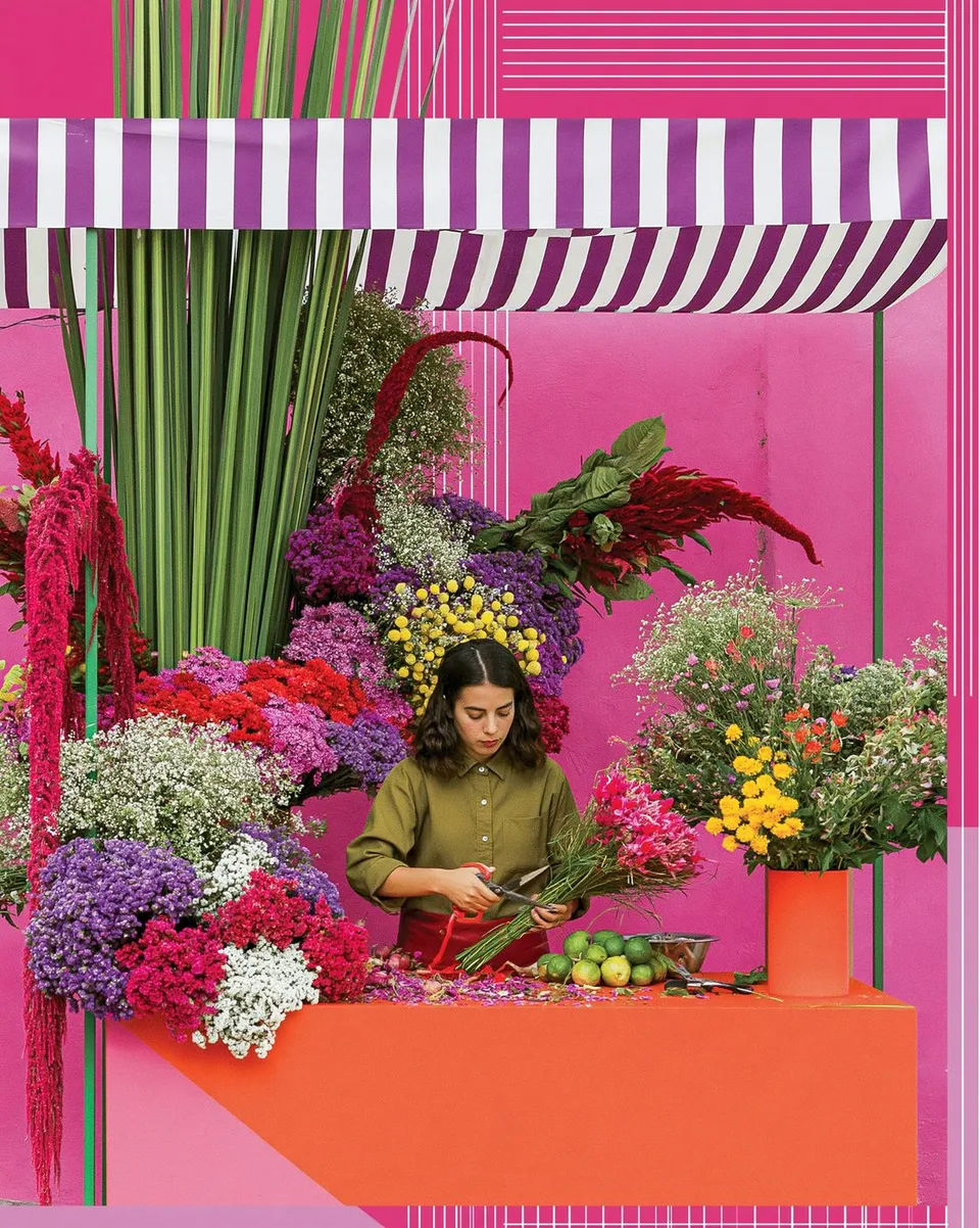 a night-market florist building enormous bouquets beneath striped awnings · Variant 2 preview
